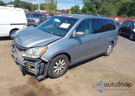 2010 Honda Odyssey Ex z USA, uszkodzony, nr VIN 5FNRL3H48AB038702